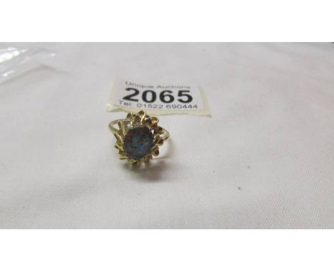 An 18ct gold ring set opal, size O half. 3.5 grams.