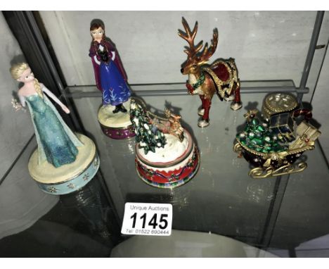 A reindeer, Santa sleigh, Elsa, Anna trinket boxes plus a musical Santa sleigh