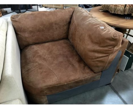 A corner leather chair/sofa