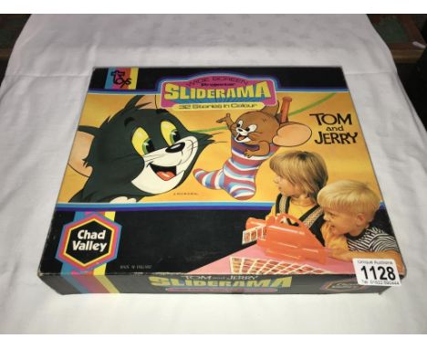 A vintage Chad Valley Tom and Jerry sliderama projector