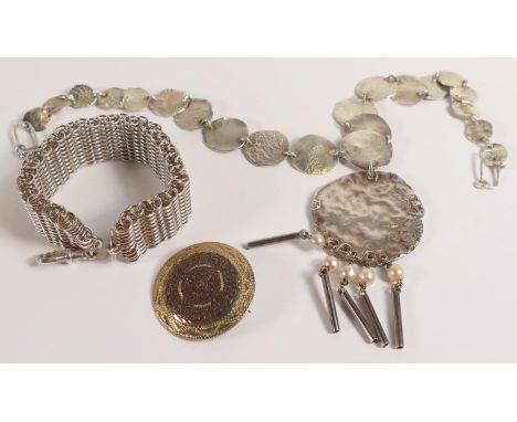 A good collection of Ladies Silver designer jewellery including bracelet, moon necklace and brooch, 154.6g. (3) 