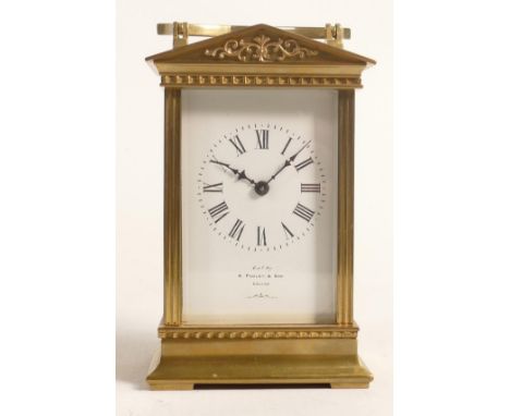 Early 20th century brass carriage clock, dial marked by A. Pooley &amp; Son, Ealing, h.13.5cm. 
