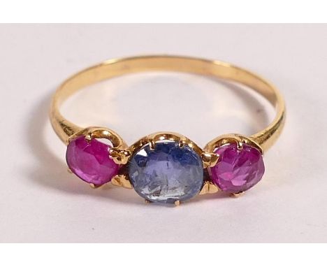 Ancient looking sapphire &amp; ruby 3 stone ring, set in very high carat gold. The old cut primitive looking irregular shaped