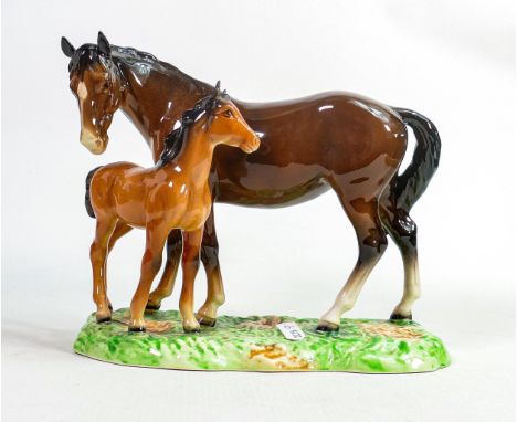 Beswick model of brown mare and chestnut foal953, on ceramic grassy base. 