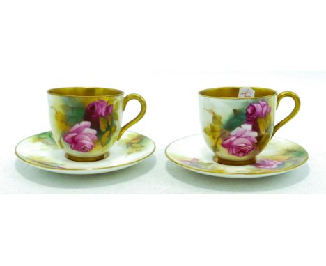 Pair of Royal Worcester small cups and saucers hand painted with roses by M Hunt, puce marks, Hairline cracks to both saucers