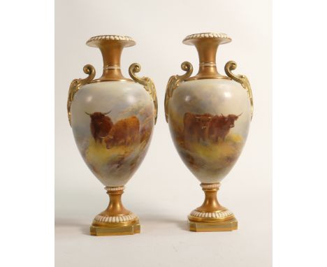 Pair of Royal Worcester two handled vases, hand painted with Highland cattle by H Stinton, puce marks and dated 1912, h.22.25