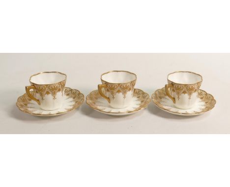 Three 19th century Doulton Burslem gilded cups and saucers. (6) 