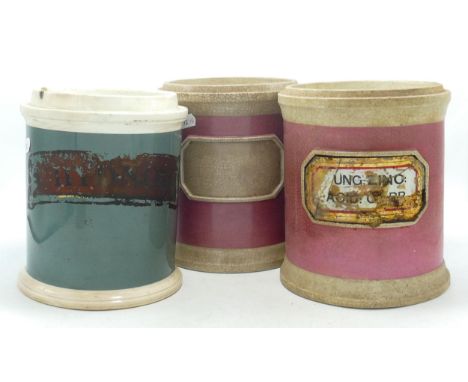 Early 20th ceramic apothecary jars, height 20cm (3)(a/f - damaged noted to one label area). 