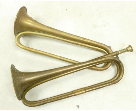 Two American brass bugles, one with US motif &amp; the other a Boosey &amp; Co. 1916 item, length 43cm (2) 