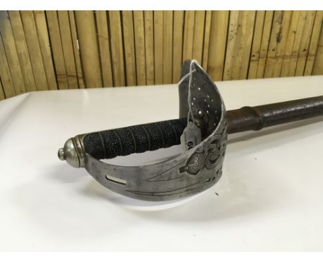 0FFICER'S DRESS SWORD IN LEATHER SCABBARD