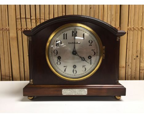 GARRARD MANTEL CLOCK. TRIPLE BARREL WIND MOVEMENT , CHIMING ON FIVE GONGS, MAHOGANY CASE WITH REEDED COLUMNS (KEY AND PENDULU