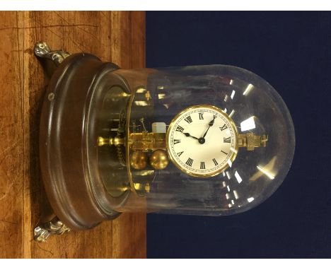 A BRIGGS ROTARY PENDULUM CLOCK UNDER DOME