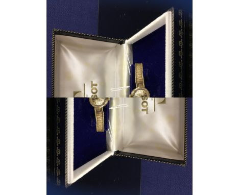 LADIES 9CT. GOLD TISSOT WRIST WATCH ON 9CT. GOLD BRACELET PRESENTED IN ORIGINAL BOX