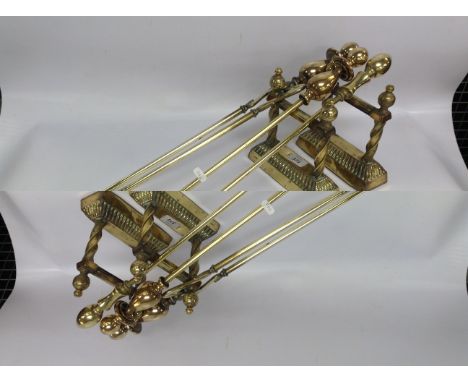 2 HEAVY BRASS FIRE DOGS WITH BARLEY TWIST DETAIL AND 3 'MATCHED' FIRE TOOLS