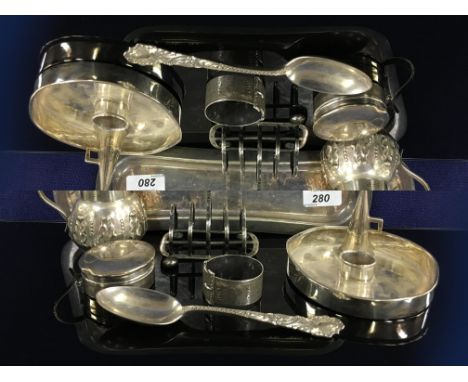7 ITEMS OF SILVER ON A PLATED ASPREYS TRAY TO INCLUDE CREAM JUG, TOAST RACK, CANDLE TRAY AND SNUFF, SERVIETTE RING, PILL BOX 