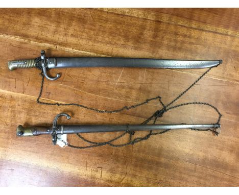 TWO FIRST WORLD WAR BAYONETS IN SCABBARDS