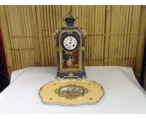 CONTINENTAL CHINA MANTLE CLOCK PAINTED WITH CLASSICAL SCENES ALONG WITH A DRESDEN PORCELAIN TRAY WITH PAINTED LOVERS TO CENTR