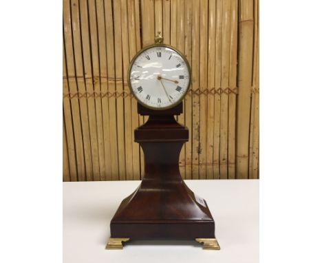 REGENCY PERIOD MANTEL CLOCK, BRASS CASED DRUM CLOCK WITH FUSEE MOVEMENT ON MAHOGANY BASE AND BRASS FEET
