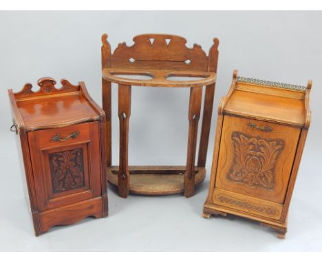 Edwardian walnut purdonium, with a foliate carved panel door, 36cm w, together with another similar oak purdonium and an oak 