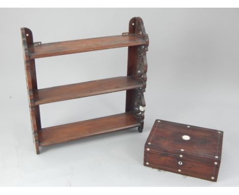 Victorian walnut three tier hanging wall shelf, with pierced end supports, 60cm w, together with a rosewood and mother-of-pea