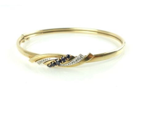 9ct yellow gold bangle, set with diamonds and sapphires to top, 7.1g