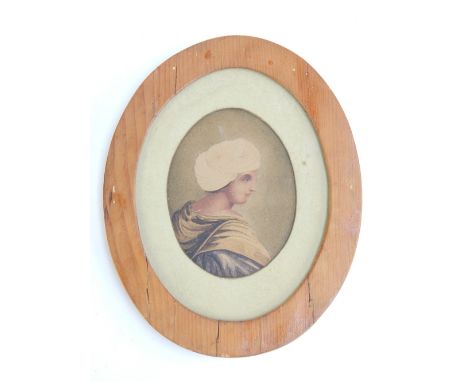 A antique watercolour portrait in profile of a young woman in a turban (oval 11x 8cm) in a pine frame. 