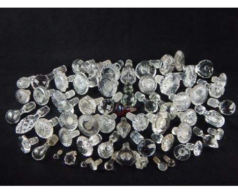 Quantity of decanter stoppers, including a cranberry glass example (qty)