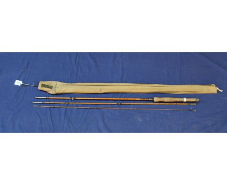 An Ogden Smith three piece vintage rod (ring missing)