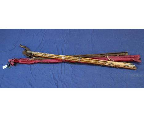 Two vintage rods with unusual rod holder and vintage bamboo landing net handle and Abu Atalntic 443 zoom 9' rod