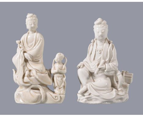 A Chinese Dehua figure of Guanyin, seated holding a scroll, impressed double gourd mark to back, 14cm high and a Chinese Dehu
