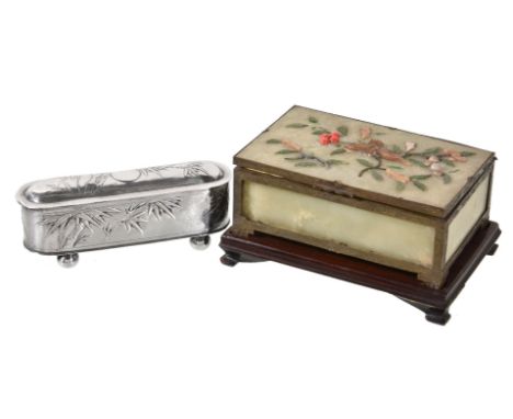 A Chinese export silver oblong table box by Tuck Chang & Co., Shanghai, circa 1900, embossed with a vacant roundel and bamboo