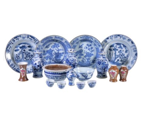 An assembled group of Chinese blue and white porcelain, 18th and 19th century, comprising a miniature vase and cover 9.4cm hi