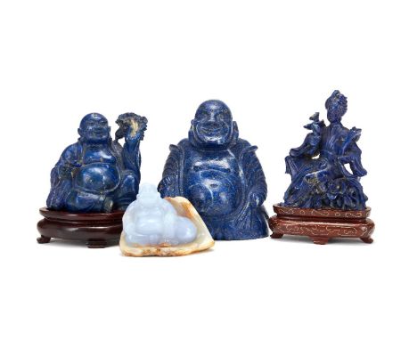 A Chinese Chalcedony carving of a Buddha, carved with light purple coloured stone against a mottled brown exterior stone, 6,5