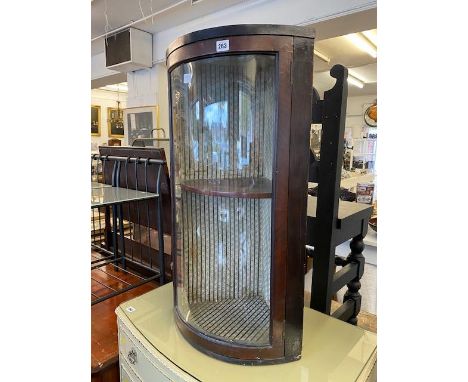 A Mahogany bow front corner display cabinet