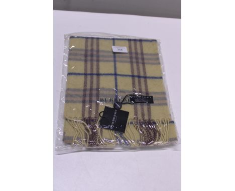 A new with tags Burberry 100% lambs wool yellow long scarf 120 x 23cm 