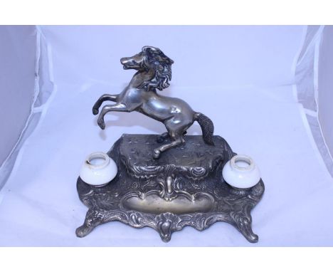 A antique base metal ink stand 