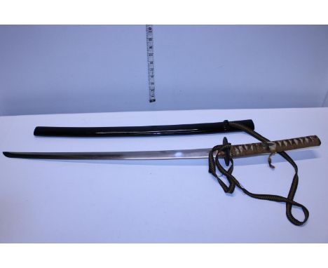 A vintage Samurai sword in scabbard, slight damage to thread on handle, 59cm blade length, measured from Habaki, shipping una