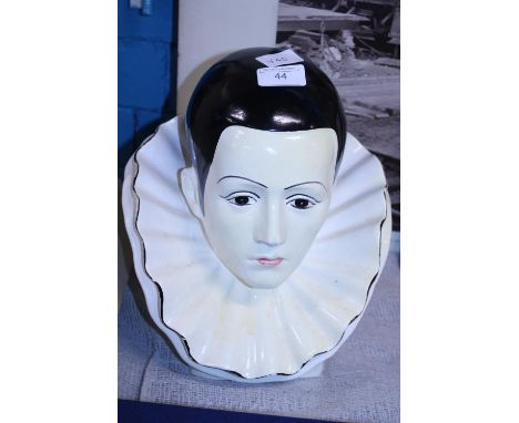 A ceramic bust of a Pierrot clown 