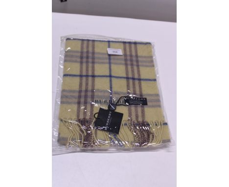 A new with tags Burberry 100% lambs wool yellow long scarf 120 x 23cm 