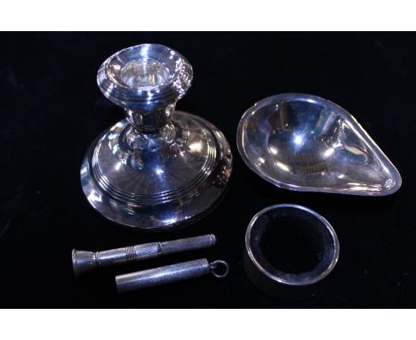 A selection of hallmarked silver items including a dwarf candlestick 