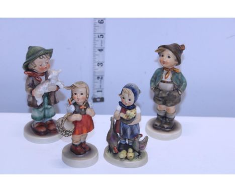 Four assorted Goebel figurines 