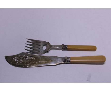 A hallmarked silver collared fish knife and fork 