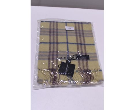 A new with tags Burberry 100% lambs wool yellow long scarf 120 x 23cm 