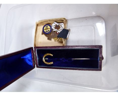 HORSESHOE PIN. Boxed Horseshoe pin and enamel badges