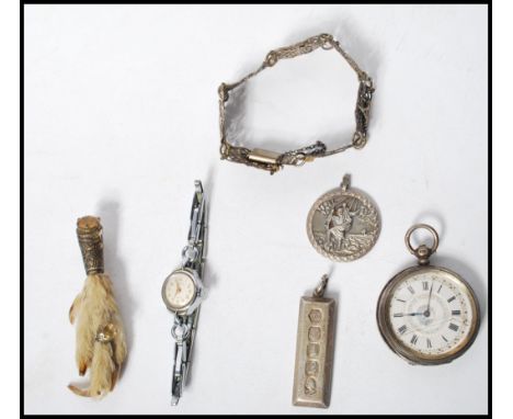 A group of vintage jewellery and watches to include a hallmarked silver Scottish taxidermy claw brooch with two citrine stone