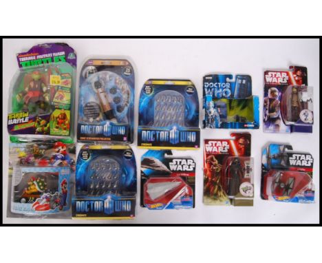 An assorted collection of Character Options, Hasbro, Giochi Preziosi &amp; others carded &amp; plastic cased action figures t