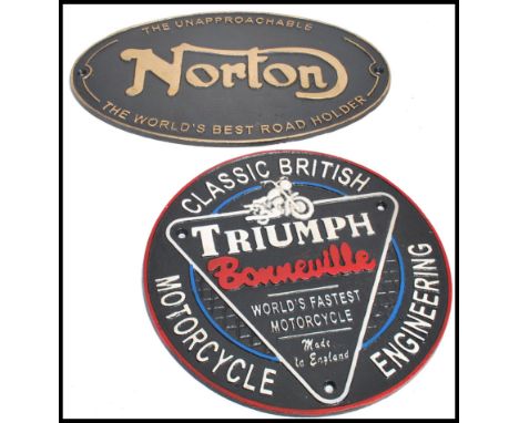 A pair of vintage style cast metal point of sale advertising garage wall plaques for Norton and Triumph motor cycles. Measure