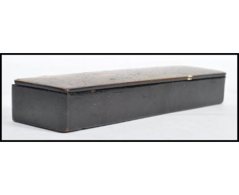 A 19th century papier mache pen box, the lid decorated with scene of girl and boy playing in the countryside. HIgned top with