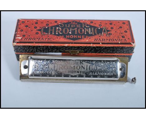 A vintage 20th century cased M Hohner Super Chromonica No2601/2 Chromatic Harmonica