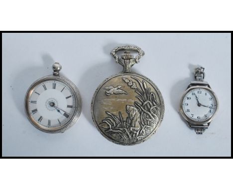 A silver continental pocket watch having an enamel face with faceted hands and a roman numeral chapter ring, a silver wrist w